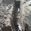 Trench after removal of pipe fills, photograph from an archaeological excavation at Acheson House, Canongate, Edinburgh