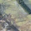 Oblique aerial view of the townships, farmsteads, field boundaries and rig at Craig Dubh-Leitir, looking W.