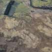 Oblique aerial view of the townships, farmsteads, field boundaries and rig at Craig Dubh-Leitir, looking SSW.