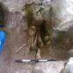 Charnel against wall 7, trench 3, photograph from trial trenching at Barony Centre, West Kilbride
