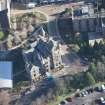 Oblique aerial view of St Leonard's Hall, looking E.