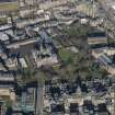 Oblique aerial view of Greyfriars Church, George Heriot's School and Royal Infirmary, looking N.