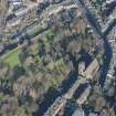 Oblique aerial view of St Michael's Parish Church, Beadle's House and North Merchiston Cemetery, looking NNE.