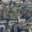 Oblique aerial view of St Michael's Parish Church and Beadle's House, looking NNW.