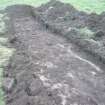 View of the bedrock in trench 3, photograph from final report from archaeological evaluation at Hillwood Farm, Ratho, Edinburgh