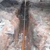 Excavated pipe trench, photograph from archaeological evaluation at Edinburgh Napier University, Merchiston Campus