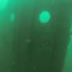 View of portholes and door towards stern on HMS Roedean