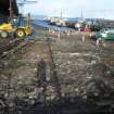 View of area cleared of cobbles (facing E), during archaeological monitoring at James Warr Dock, Greenock