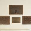 Detail of plaques in entrance hall in Phase 2 building.