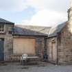 General view of stable block from south.