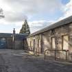 General view of stable block from east.