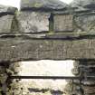 Detail of carved lintel above window on south wall (daylight)