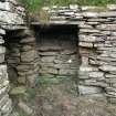 Outbuildings, blocked opening in N wall of principal range