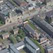 Oblique aerial view of St Columbkille's Roman Catholic Church and Rutherglen Town Hall, looking NNE.