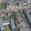 Oblique aerial view of St Columbkille's Roman Catholic Church and Rutherglen Town Hall, looking N.