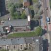 Oblique aerial view of St Columbkille's Roman Catholic Church and Rutherglen Town Hall, looking W.