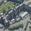 Oblique aerial view of Cathedral of St Mungo Burial Ground and the Royal Infirmary, looking SE.