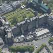 Oblique aerial view of Cathedral of St Mungo Burial Ground and the Royal Infirmary, looking E.