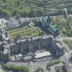 Oblique aerial view of Cathedral of St Mungo Burial Ground, Glasgow Cathedral and the Royal Infirmary, looking E.