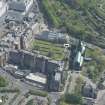 Oblique aerial view of Cathedral of St Mungo Burial Ground, Glasgow Cathedral and the Royal Infirmary, looking ENE.