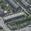 Oblique aerial view of 36 Ibrox Terrace, Strathbungo Station and Moray Place, looking SSE.