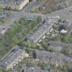 Oblique aerial view of 36 Ibrox Terrace, Strathbungo Station and Moray Place, looking NNE.