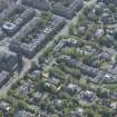 Oblique aerial view of Pollokshields Parish Church, The Knowe villa and lodge, looking SSE.