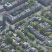 Oblique aerial view of Pollokshields Parish Church, The Knowe villa and lodge, looking SE.