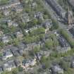 Oblique aerial view of Pollokshields Parish Church, The Knowe villa and lodge, looking ENE.