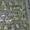 Oblique aerial view of Pollokshields Parish Church, The Knowe villa and lodge, looking NNE.