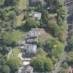 Oblique aerial view of Castlehill and Ellisland villas, looking ESE.