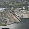 Oblique aerial view of Graving Dock, looking SW.