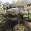 Two level lade system to east of sawmill, view from east with electricity generating house. The lower lade is disused and the water contro, flap operated from the turning mill is open to allow water to escape to outflow channel