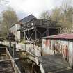 Sawmill, waterwheel, lade system and turbine for electricity generating house, view from east