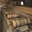 Interior. Detail of wooden rollers on saw bench. This enables the smooth feeding of wood to the saw