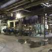 Interior general view. Boiler House. Basement level. Condensers - 'mini-water treatment plant' stopped build up of impurities from circulated water (and seawater) in boiler tube.