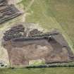 Oblique aerial view of the site under excavation.