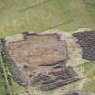 Oblique aerial view of the site under excavation.