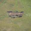 Oblique aerial view of the site under excavation.