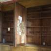 Ground floor. North room (library). Detail of bookcases.
