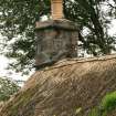 Detail of roof line and chimney base on small traditional cottage, Auchindrain township museum, Loch Fyne.