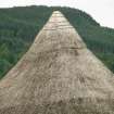 Detail of thatched roof and apex on reconstructed crannog, Croft-na-Caber Loch Tay.