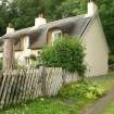 Side view of 1889 single storey thatched house; Kirkton Cottages,Fortingall.