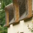 Detail of thatching above dormer windows; Kirkton Cottage, Fortingall.