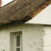 Detail of thatched roof at gable end; West End Cottages, Rait.