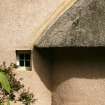 Detail of cottage showing concrete edge between main block and roof of the wing; Norman Cottage, Mellerstain House.