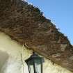Detail of thatched roof showing overhang; 12 Swanston Village, Edinburgh.