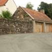 View of double garage with pantiled roof ( formerly listed as "low 2 storey thatched house"); 4 Gladgate, Auchtermuchty.