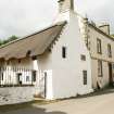 View of early 18th century 2 storey thatched cottage; Hugh Miller's Cottage, Cromarty.
