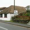 View of renovated croft building with straw thatched roof; Giant McAskill Museum, Dunvegan.